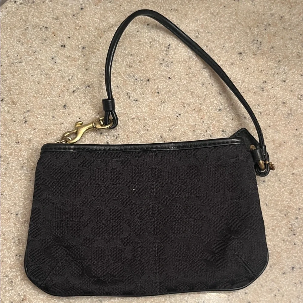 Coach Black Wristlet with Gold Emblem